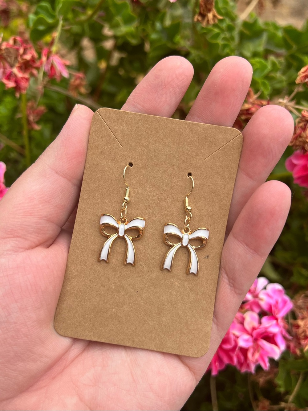 WHITE BOW DANGLE EARRINGS